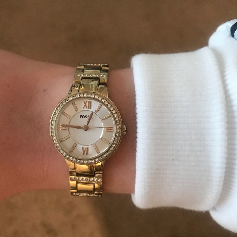 Gold fossil watch